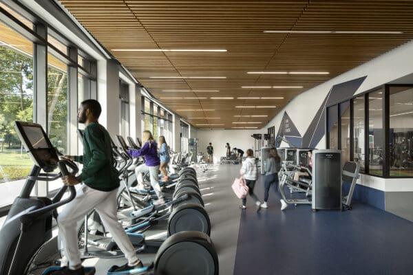 Students using ellipticals in the new Erie Hall building.