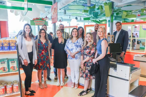 Team members of WMF at the grand opening of the children's museum 2023